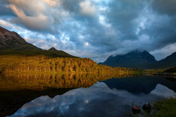 Morning light over a loch on the west coast of Scotland
