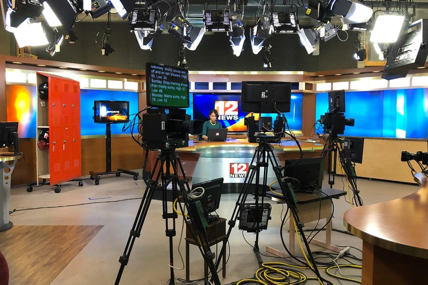 A view of an American news studio from behind the cameras