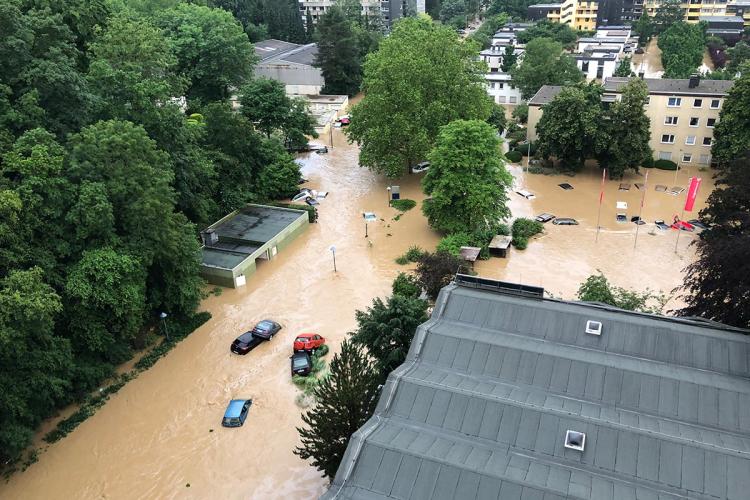 Aerial view of a flooded street in a town